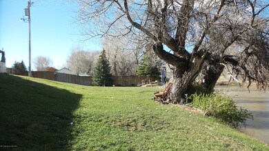 Gently sloped lawn to river