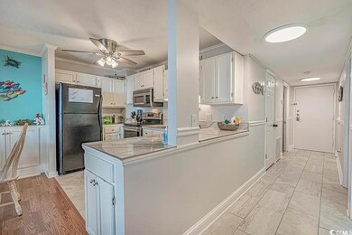 Kitchen with appliances with stainless steel finis