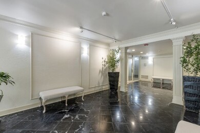 The elevator is straight through the lobby.