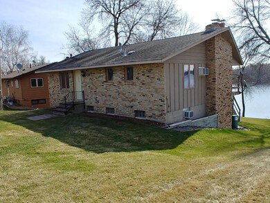 Front entrance shows the size of this home and the