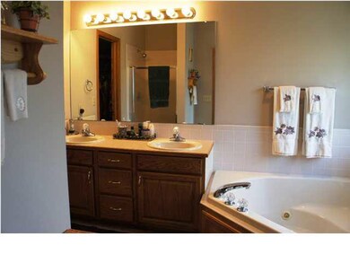 Master bath with big corner tub with jets!