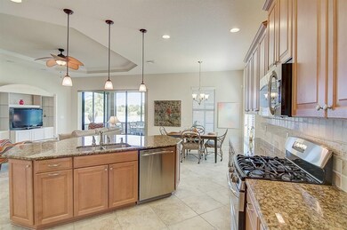 The open concept kitchen is clad with premium fini