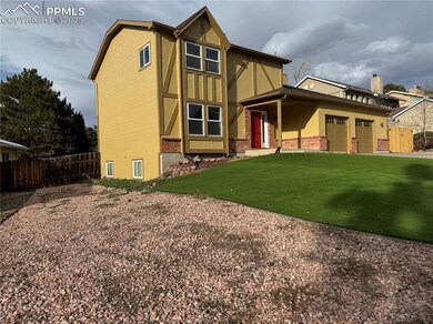 View of front of property with driveway, an attach