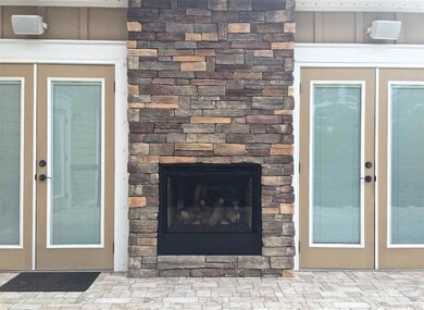 double-sided fireplace, perfect for entertaining
