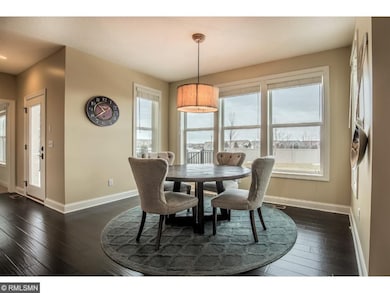 Window wrapped dinette with convenient deck access