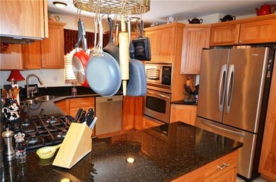 ANOTHER VIEW OF THE KITCHEN.