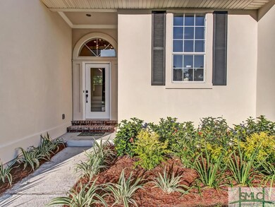 Reconfigured front entrance, new door, new landsca