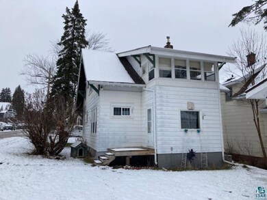 View of snow covered property