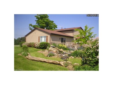 Backyard features waterfall and loads of perennial