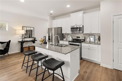 Kitchen with appliances with stainless steel finis