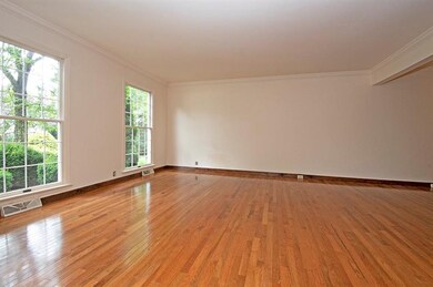 Brand new gleaming hardwood floors in living/dinin