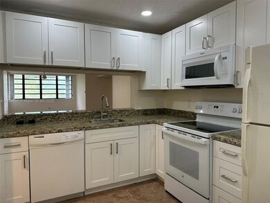 3150 NW 42nd Ave unit E401, Coconut Creek, FL 33066 - photo 4