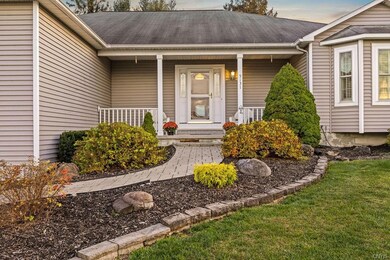Nice brick walkway with mature landscaping.