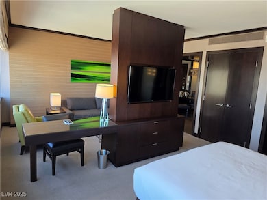 Carpeted bedroom featuring a closet