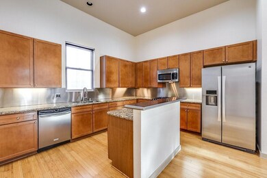 Kitchen featuring appliances with stainless steel 