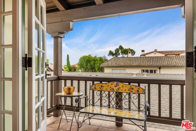 Primary covered balcony