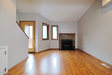 Living Room with Granite Tiled FIreplace