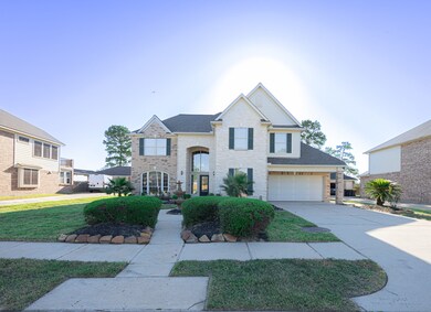 Brick and stone exterior that creates stunning curb appeal.  Double wide driveway that provides plenty of parking space.