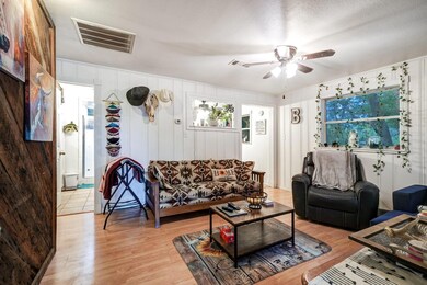 Living room featuring light hardwood / wood-style 