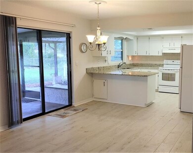 sliding glass doors from dining area open to lanai