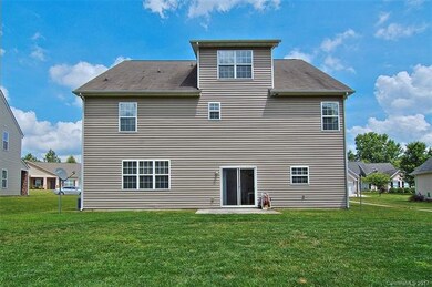 Exterior stating concrete patio perfect for family