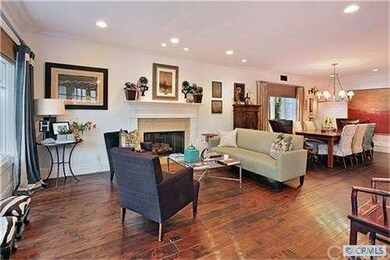 Living room  with wood burning fireplace  and waln