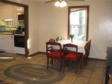 Ceramic tiled open dining area.
