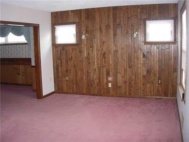 Living Room. 1 WALL FINISHED W/ T&GROOVE OAK