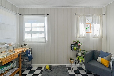Interior space featuring a healthy amount of sunlight and tile patterned floors