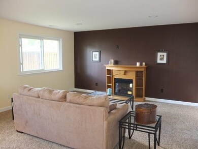 Family room with fireplace.