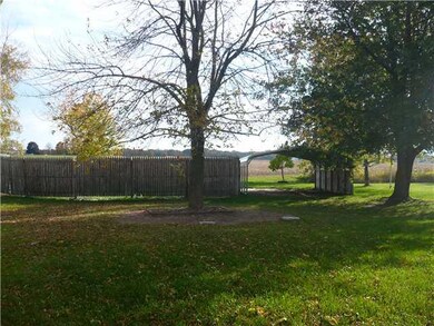 Exterior Front. Carport structure is newer and str