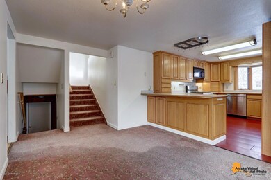 Oversized kitchen open to dining area
