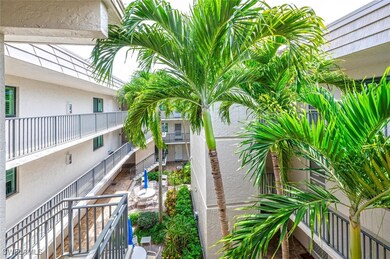 This atrium is in the center of the building, always a tropical feel.