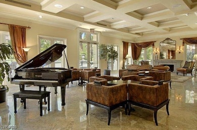 Club house featuring beam ceiling, crown molding, coffered ceiling, and recessed lighting