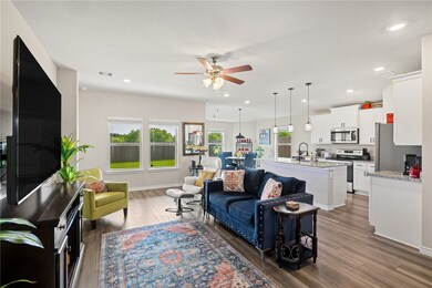 Living room featuring wood finished floors, a ceil