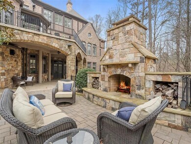 Custom stone fireplace with seating located by the