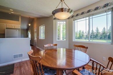 7574 Navajo Valley Dr SW unit 11, Byron Center, MI 49315 - photo 2