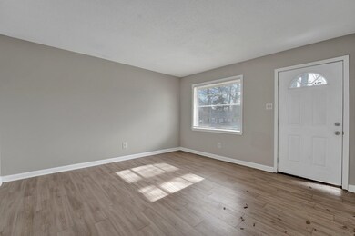 Foyer featuring a healthy amount of sunlight and l