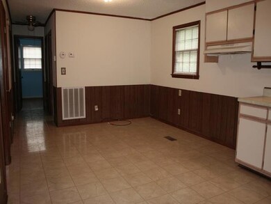 Large 12x19 dining/kitchen combo. Room for china cabinet and more.