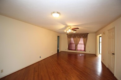 Great room features hardwood flooring.