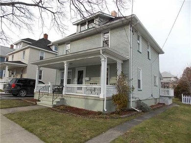 Exterior Front. Newer vinyl siding, gutters and re