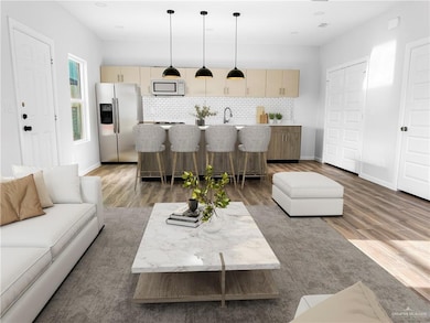Living area featuring light wood-style flooring