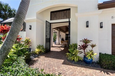 View of exterior entry with stucco siding