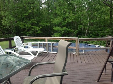 Back deck off kitchen with above...