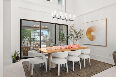 Dining area featuring tile patterned floors, a hi