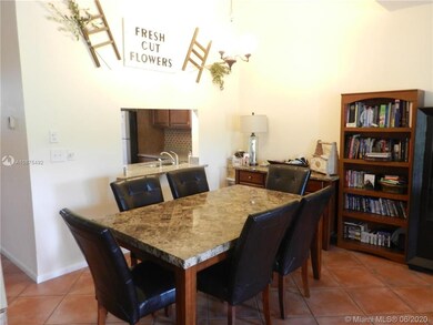 Spacious dining room with high ceilings