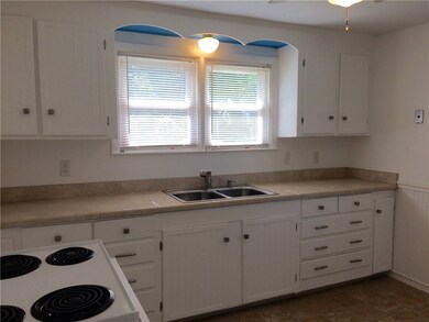 kitchen has room for table and chairs too,, electr