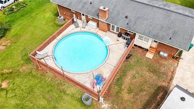 View from above of property with a pool area