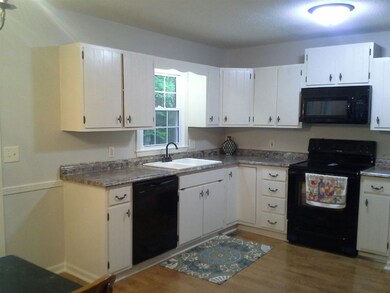 Newly painted cabinets and new countertops with be