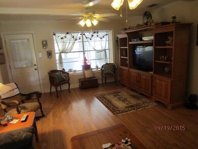 Den with Pergo flooring.